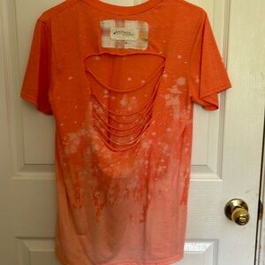 SIZE S, fits like a M. Cute split back .